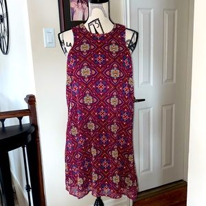 New sleeveless dress size large. Sheer top with liner